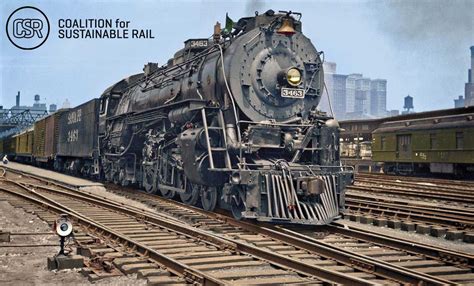 On July 6, 1948 , Santa Fe steam locomotive No. 3463 rests between runs ...