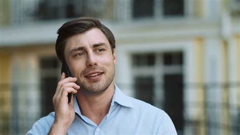 Man Talking On Phone Outdoors: Business Stock Footage SBV-338043605 - Storyblocks