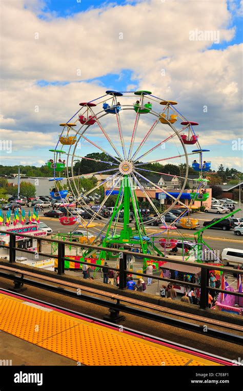 Ferris Wheel carnival rides seen from above, view from LIRR elevated platform, Bellmore Festival ...