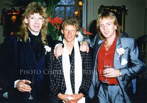 Robert John "Mutt" Lange flanked by The Terror Twins, Steve Clark and ...