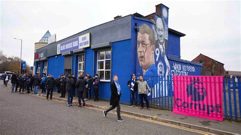 Angry Everton fans march to Goodison Park in protest at 10-point ...