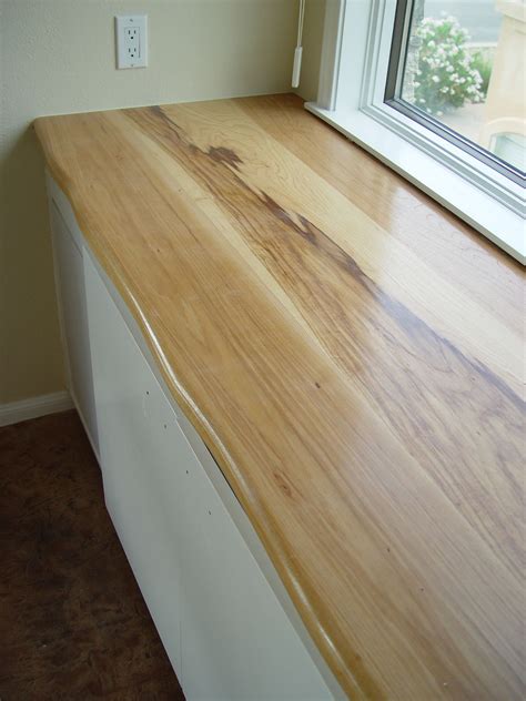 Custom solid wood face grain Pecan counter top with natural wane edge ...