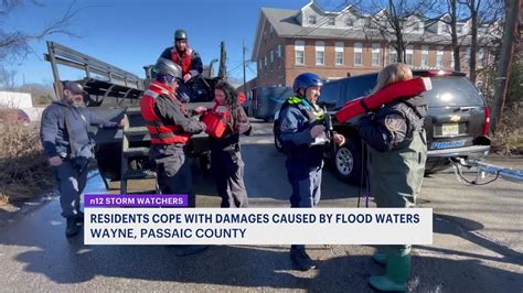 Wayne homeowners evacuate as floodwaters enter homes, cars