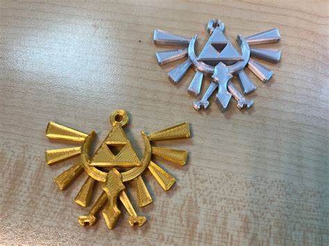 The Legend of Zelda Hyrule Crest Keychain - Etsy