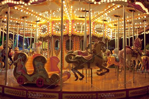 Carousel at night | High-Quality Arts & Entertainment Stock Photos ~ Creative Market