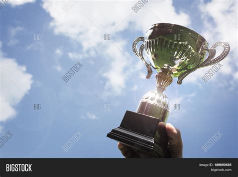 Celebrating Trophy Image & Photo (Free Trial) | Bigstock