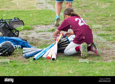 Softball bats hi-res stock photography and images - Alamy