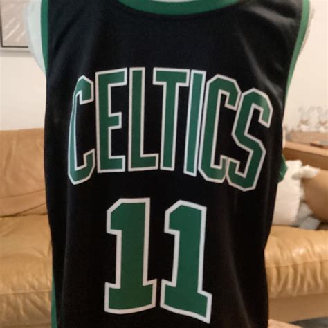 A Kyrie Irving Celtics jersey only worn 3 times it... - Depop