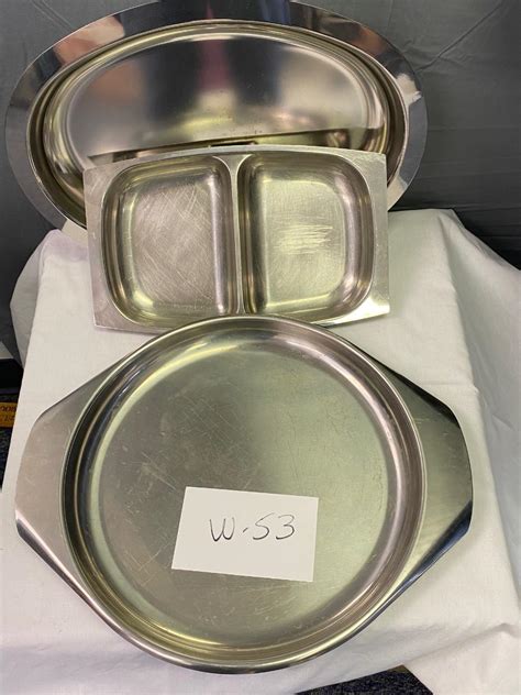 3 stainless Serving Trays | EstateSales.org