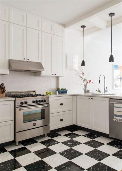 black and white checkered floor tiles in the kitchen #kitcheninspo | White kitchen floor ...