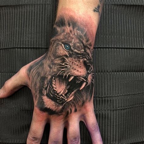 My lion hand tattoo done by the brilliant Niorkz - Creative Vandals ...