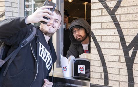 Eminem surprises fans at opening of Mom’s Spaghetti restaurant in Detroit