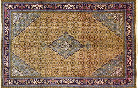 Lot - A Persian Hand Knotted Ardebil Carpet, 290 x 195