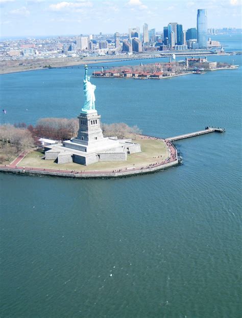 The Hawk's View: Statue of Liberty, New York Harbor USA