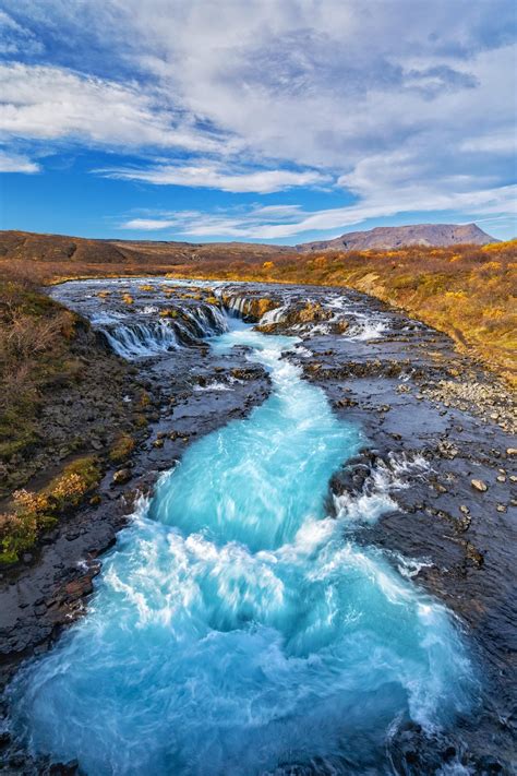 This waterfall in Iceland is incredibly blue [OC] [3686x5529] : r/EarthPorn