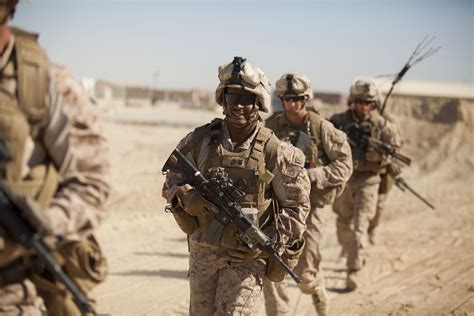 File:U.S. Navy Hospital Corpsman 2nd Class Branden Johnson, center, assigned to the Marine Corps ...