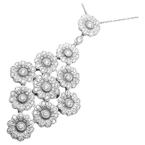 Tiffany and Co. Keys Daisy Key Diamond Platinum Pendant at 1stDibs | tiffany daisy key pendant