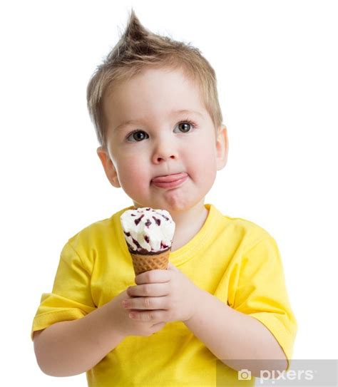 Wall Mural kid eating ice cream isolated on white - PIXERS.CA