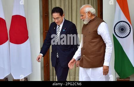 Japanese Prime Minister Fumio Kishida (2nd from L) holds talks over dinner with Egyptian ...