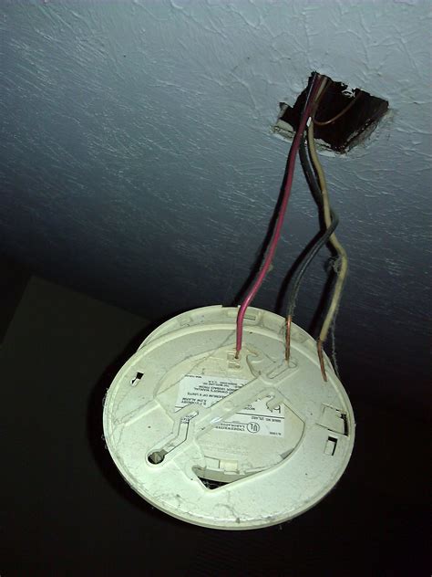 electrical - How do I cap the wires in this electric smoke alarm? - Home Improvement Stack Exchange