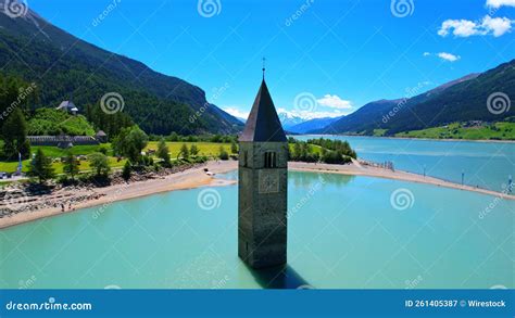 Church Tower in Lake Reschen - South Tyrol - Italy - 4k Drone Photo Stock Image - Image of ...