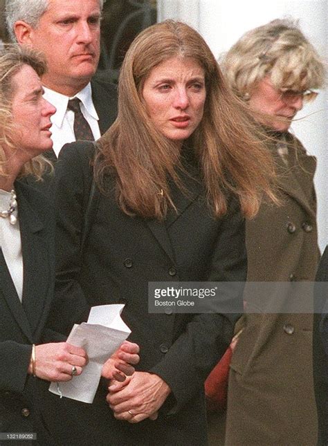 A teary-eyed Caroline Kennedy leaves the funeral mass for Michael... | Caroline kennedy, Michael ...