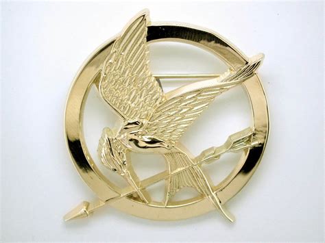 Charitybuzz: Official Limited Edition Hunger Games Mockingjay Pin in 1 ...