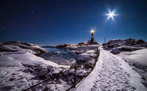 Download wallpapers lighthouse, snow, blue sky, winter, moonlight for ...