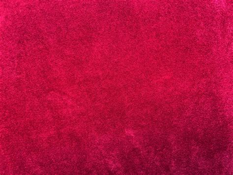 Dark red velvet fabric texture used as background. Empty dark red fabric background of soft and ...