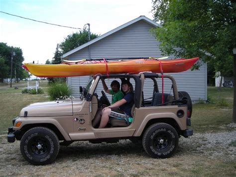 Image result for hauling kayak in 1997 geo tracker | Kayak rack, Kayak roof rack, Canoe rack