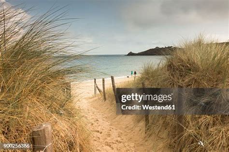 France Bretagne View To The Sea With Walkers On The Beach And Beach Dunes In The Foreground High ...