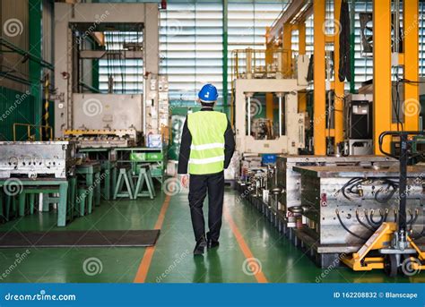 Engineer Walk Along Production Department in Factory Stock Photo ...