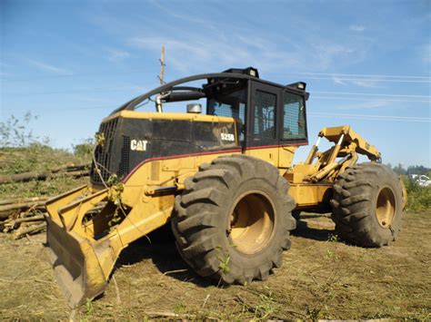 Our 525B Caterpillar Skidder | Logging equipment, Logging industry ...