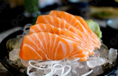 Raw salmon slice or salmon sashimi - stock photo 1271080 | Crushpixel