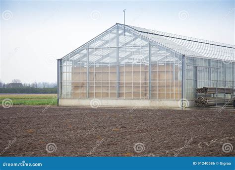 Glass house in landscape stock photo. Image of growing - 91240586