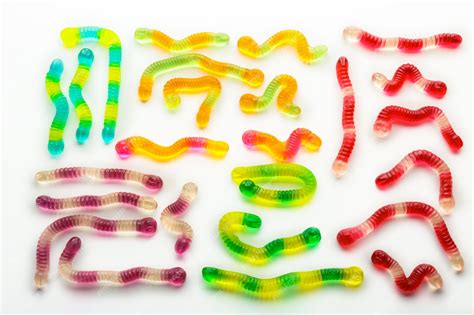 Premium Photo | Composition of colorful jelly worms on white background