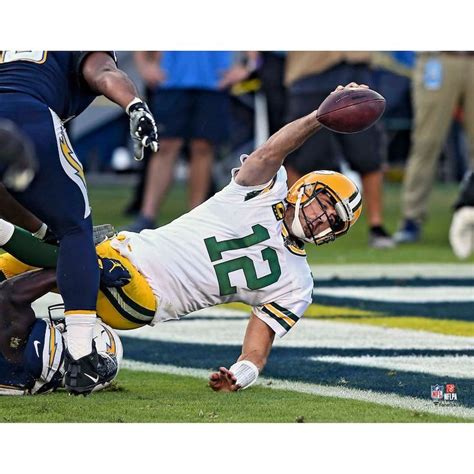 Aaron Rodgers Green Bay Packers Unsigned Scoring Touchdown Photograph in 2022 | Aaron rodgers ...