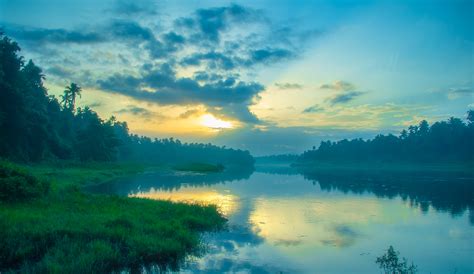 File:Chalakudy River bank on a summer sunrise.jpg - Wikimedia Commons