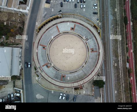 An aerial view of arena for bullfighting near road with cars Stock ...