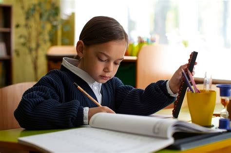 Premium Photo | Medium shot girl learning math at school