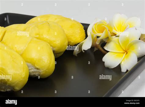 Durian on black ceramic plate Stock Photo - Alamy
