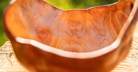 Shallow Focus Photography of Brown Wooden Bowl on a Round Wooden Surface · Free Stock Photo