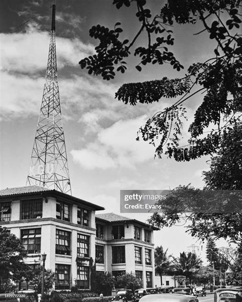 The radio mast of the KGU radio station rises above the premises of ...