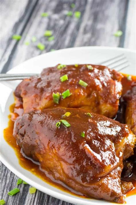 BEST Crockpot BBQ Chicken Thighs Ever • Dishing Delish