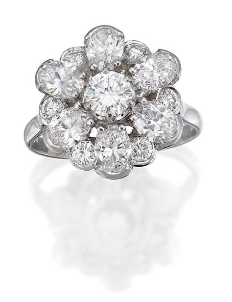 Diamond Ring Designs | Diamond cluster ring, of stepped design, the central round… - Rings ...