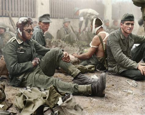 Wounded German soldiers taken as POWs by American troops during ...