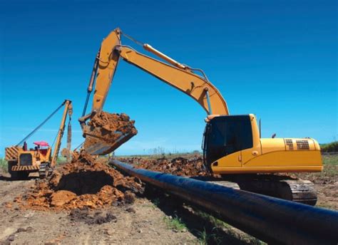 Excavator Open Trench For Pipe Laying Pipeline Stock Photo - Download ...