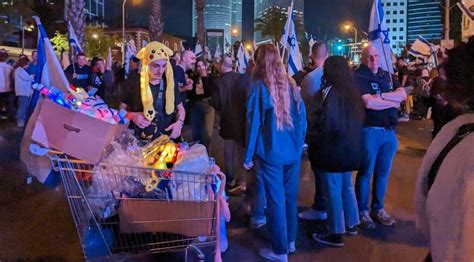 As Israel turns 75, its flag takes on new meaning at protests – J.