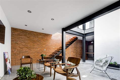 Exposed Brick Walls Steal the Show in this Modern Industrial Home!