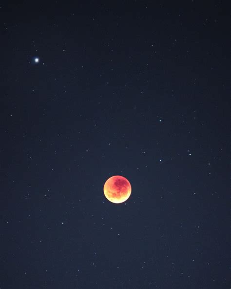 Lunar Eclipse feat. Mars : r/pics